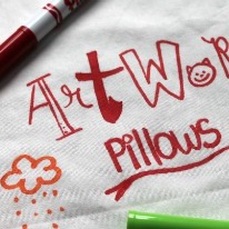 Turn artwork into pillows with fabric markers. 