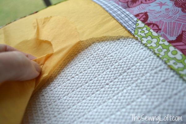 Use shelf paper to create a sewing machine mat. The Sewing Loft