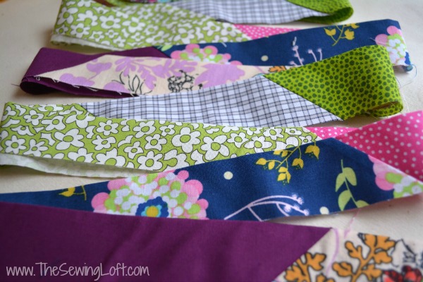 Turn leftover fabric scraps into quilt binding. How to make scrap binding. The Sewing Loft
