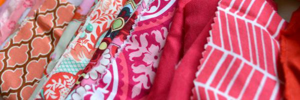 Keep your fabric stash ready for use with these easy tips. 10 useful tips to help organize fabric scraps in your studio space. Pictures included! The Sewing Loft