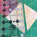 Kari Carr shows us how to create Half Square Triangles with left over fabric scraps.