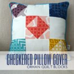 Put extra quilt blocks to use with this simple checkered pillow pattern cover.