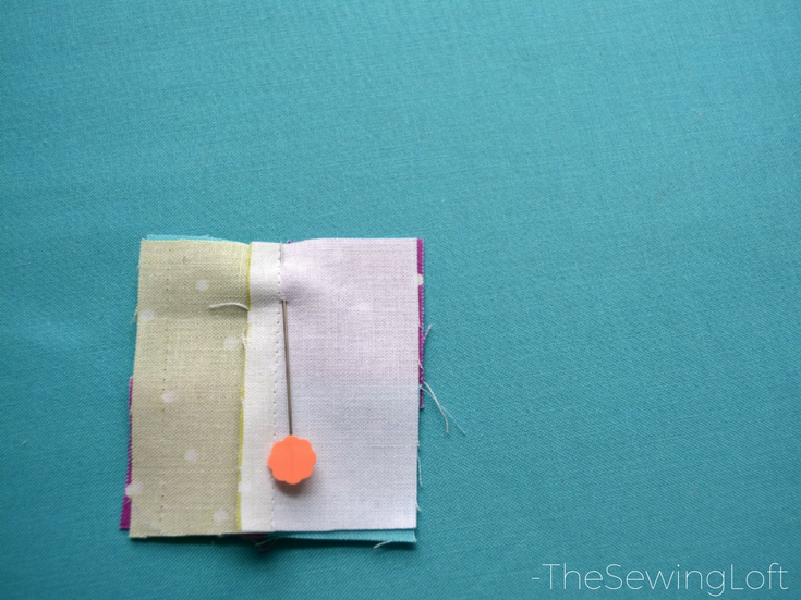 Use flat head pins to line seams up for easy stitching. 