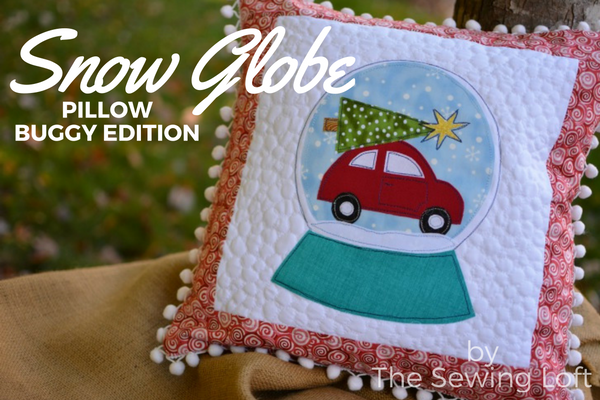 This festive snow globe inspired DIY applique pillow is the perfect addition to my holiday decor.