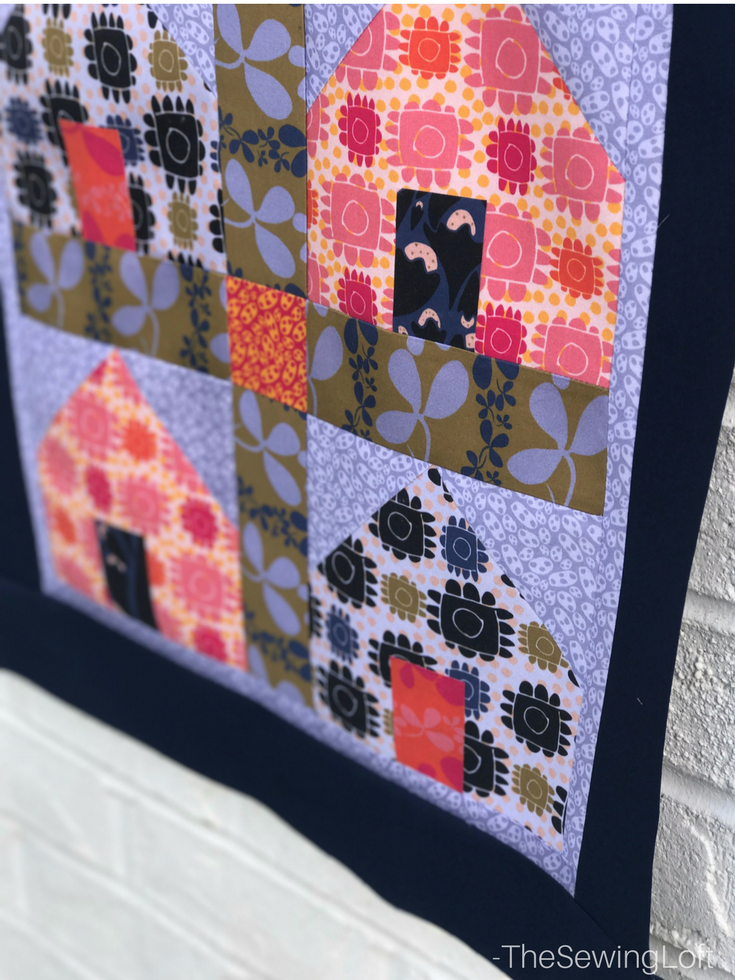 Measuring borders is easy with the Dwellings Quilt from Fabric Editions. See these quick tips and always measure right the first time, includes video.