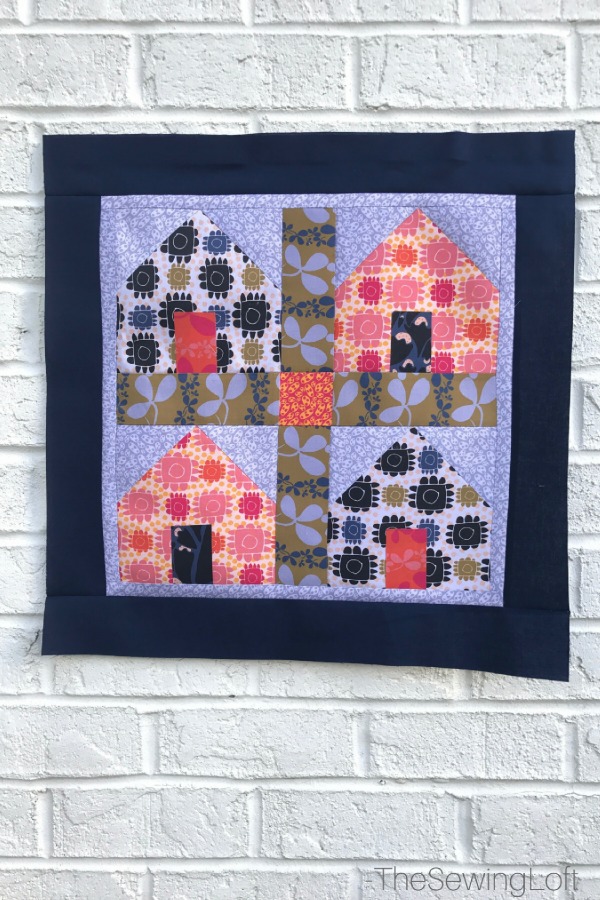 Measuring borders is easy with the Dwellings Quilt from Fabric Editions. See these quick tips and always measure right the first time, includes video.