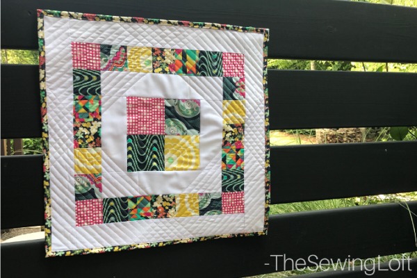 Learn how to create beautiful quilt binding with this simple DIY tip. Includes video tutorial to show you how to create this technique.