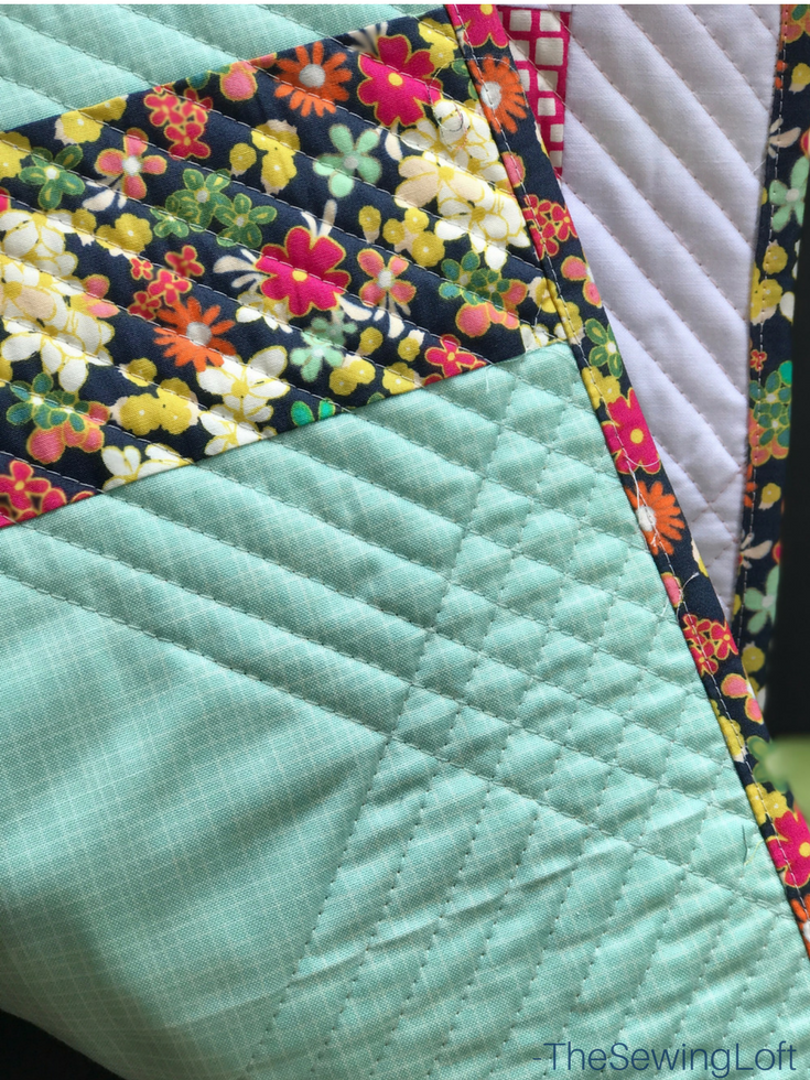 Learn how to create beautiful quilt binding with this simple DIY tip. Includes video tutorial to show you how to create this technique.