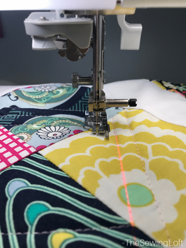 Straight quilting is beautiful and the laser beam guide makes it easy to keep your stitches straight. 