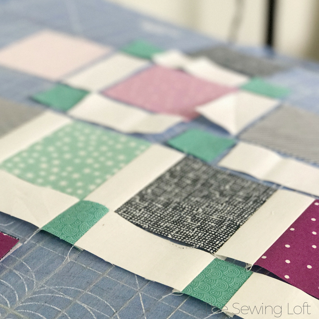 Expand your quilting knowledge while making something fun with the Quiltologie Urban Trellis mini quilt. Includes video how to for simple setting technique.