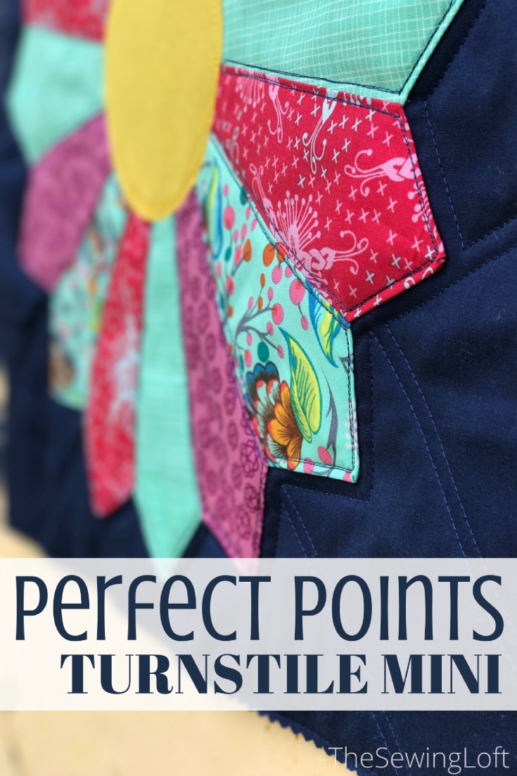 Learn how to make perfect points every time with the Turnstile mini quilt. This Quiltologie pattern includes a how to video for a dresden plate.