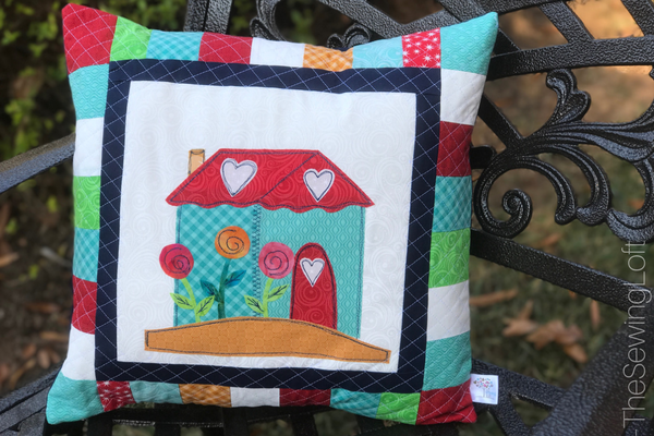 I'm finishing up the I love home quilt along with a DIY pillow project. Each block offers a fun applique design for you to stitch out. 