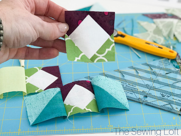 The Spring Burst Quilt Block is perfect for the confident beginner! It comes in 2 sizes, features HST's and flying geese. Perfect for your next project.