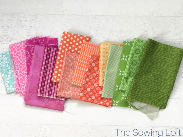 Head to your fabric stash, pull an assortment of your favorite colors and stitch up the Zinnia Flowers Quilt Block by The Sewing Loft