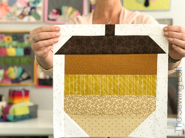 The patchwork construction of the Acorn quilt block makes it perfect for the beginner quilter and fun for the experienced quilter to play with their scraps. 