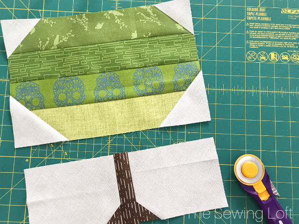 The simple patchwork construction of the Patchwork Tree quilt block makes it perfect for for quilters to play with their scraps. 