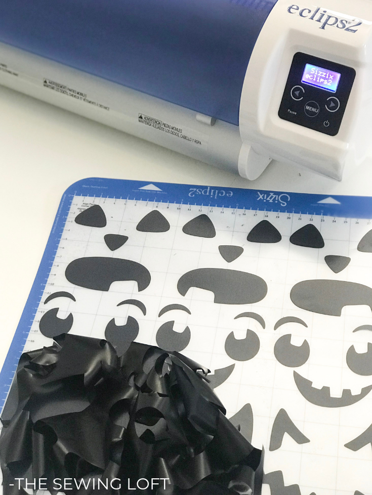 Create these easy DIY Halloween Treat Bags with a few fabric scraps, felt and a cutting machine. | The Sewing Loft