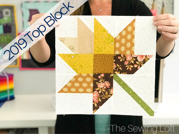 The simple patchwork construction of the Fall Leaves quilt block makes it perfect for quilters to play with their scraps. 