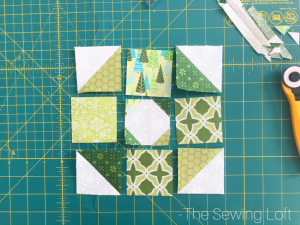 Add some festive cheer to your quilts with this easy to make, scrap friendly Holiday Wreath Quilt Pattern available in 2 sizes. Includes a bonus bow embellishment detail. 