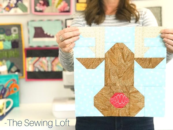 Keep the holiday spirit alive with this easy to make patchwork Rudolph the Reindeer quilt block.  The Sewing Loft