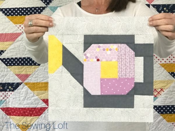 Turn your scraps into something fun with this easy to make patchwork quilt block. The Watering Can quilt block is available in 2 sizes and requires no special tools or templates. 