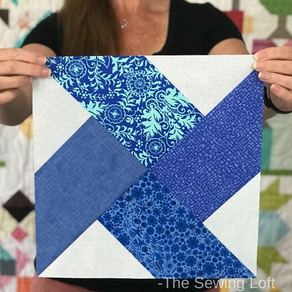Make your fabrics the star of the show with this easy to make quilt block design- Swirl-Round by The Sewing Loft. 