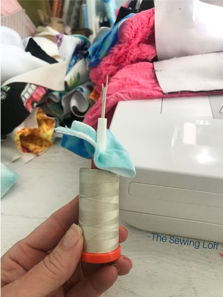 Pro Tip from The Sewing Loft- Use your seam ripper to slice between your blocks. It's fast and much easier than the scissors. 