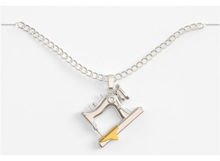 Celebrate their love of sewing with this sewing machine necklace. Find these and other affordable unique gift ideas for the quilter in your life.  