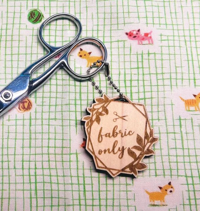 So many great gift ideas for the quilters on your list! Like these scissor charms. they are the perfect way to keep an eye on your favorite fabric scissors away from fabric. 