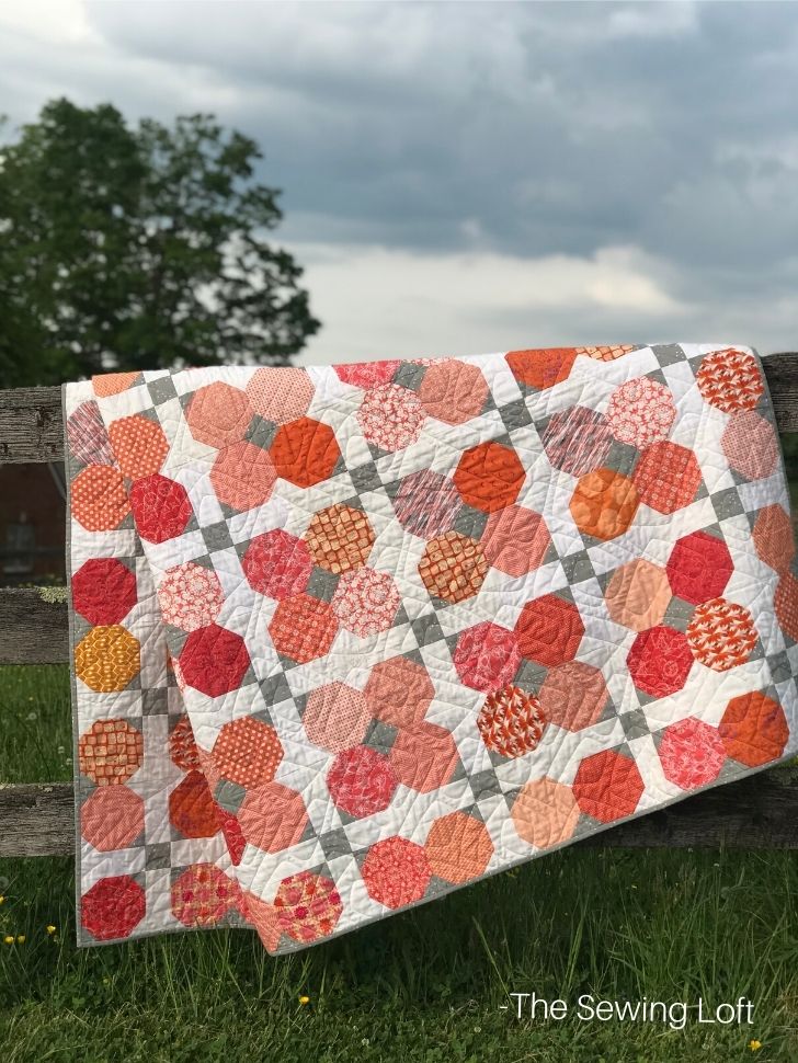 Turn your pile of scraps into a fun quilt top with Poppy Seed. A fun new quilting pattern from The Sewing Loft. 