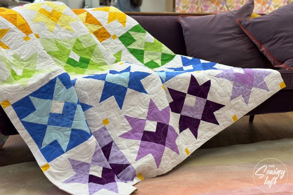 Stitch the rainbow with the Starry Heart quilt block from The Sewing Loft. Easy to make and beginner friendly.
